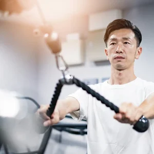 middle-aged-asian-man-training-gym