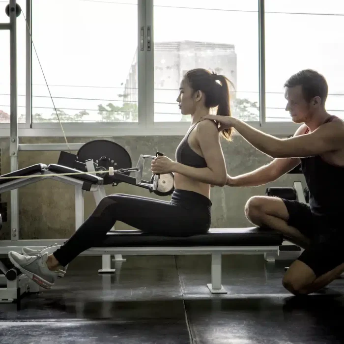side-view-woman-man-exercising-gym